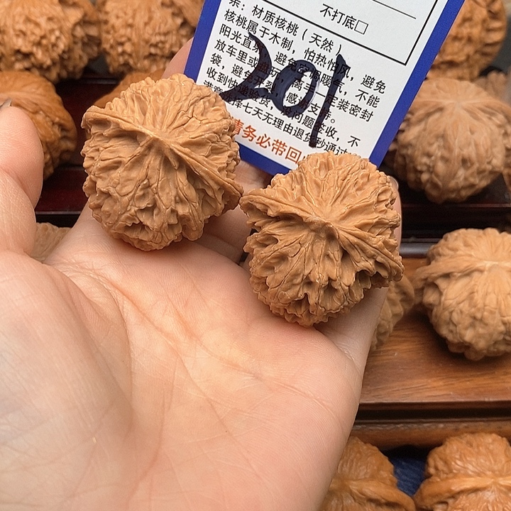 吊坠桃核苹果园狮子头40