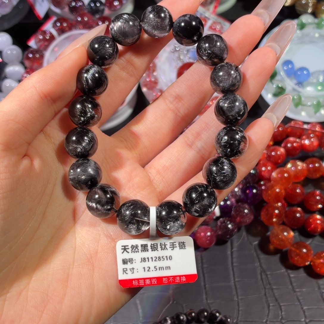 ****哈未镶嵌水晶手链满黑板状黑银钛