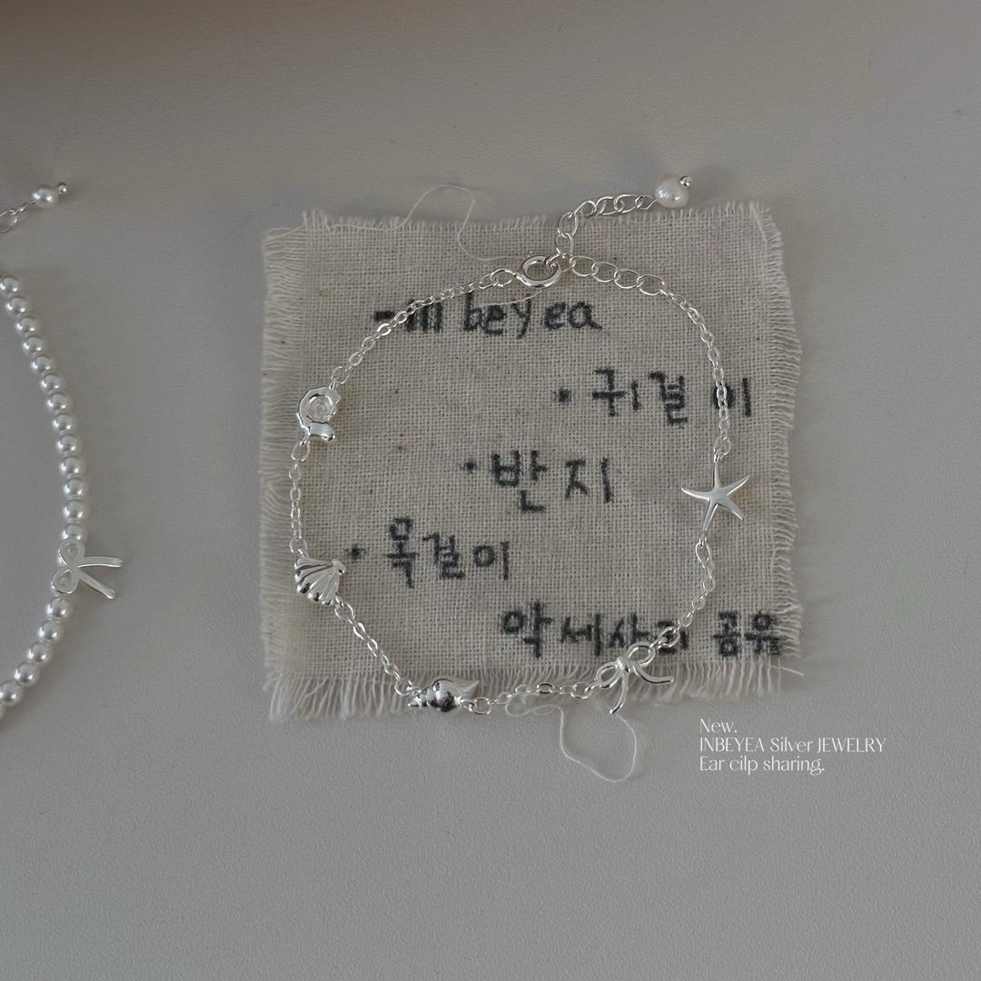 925银手链 蜗牛贝壳海螺海星蝴蝶结手链 15+3cm 31753