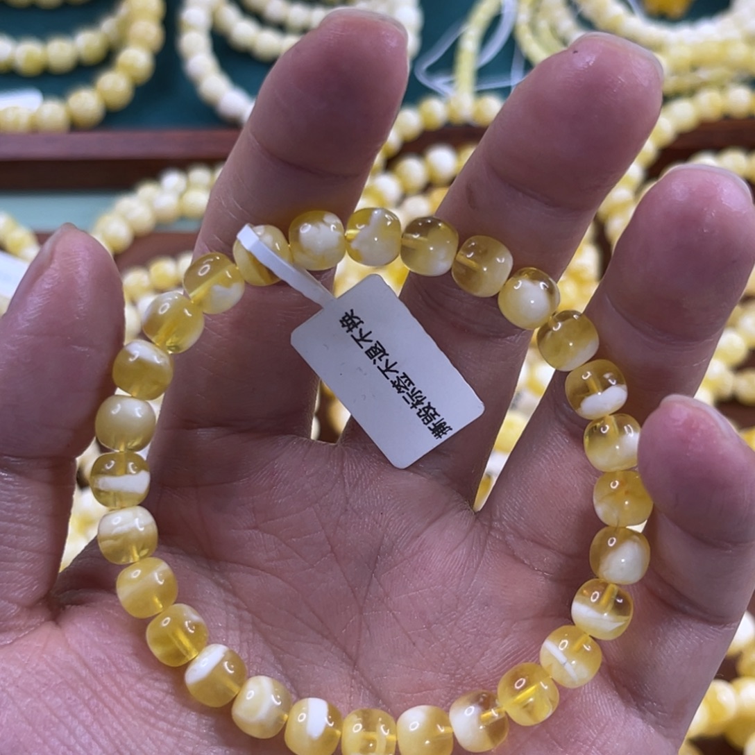蜜蜡未镶嵌珠宝奇石7.5mm金瓷白溶洞