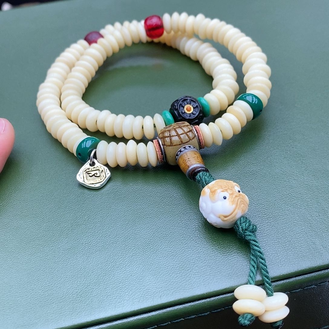 驼骨手串/手链8×3驼骨鸡油黄手持