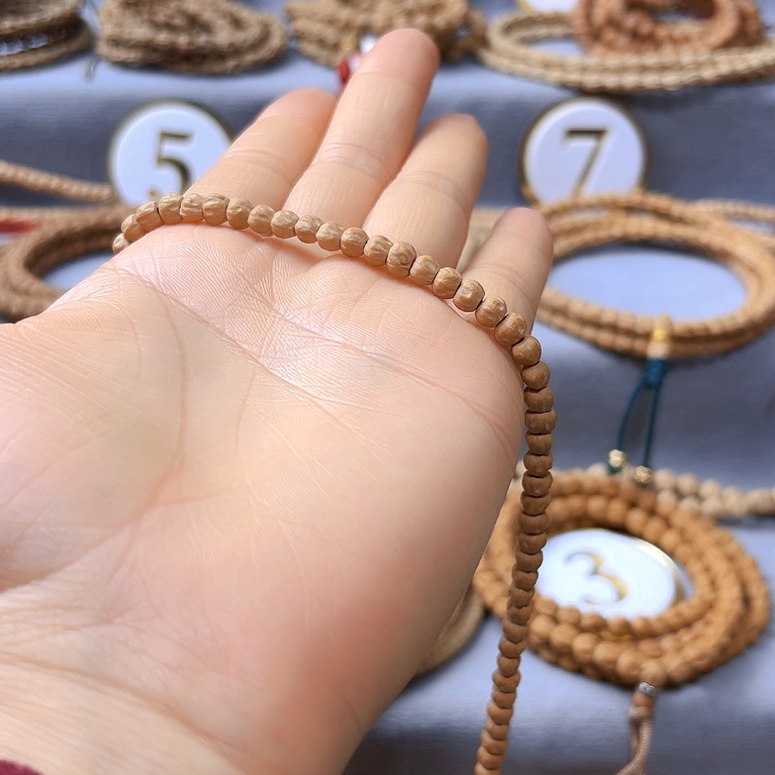 柏香籽/百香籽手串豆*王