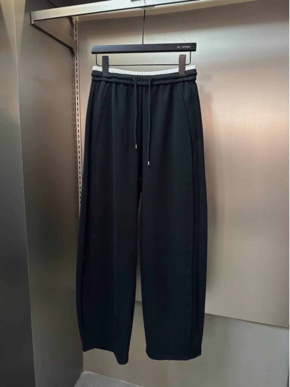 8877新宠儿女装新品简约休闲弯刀裤