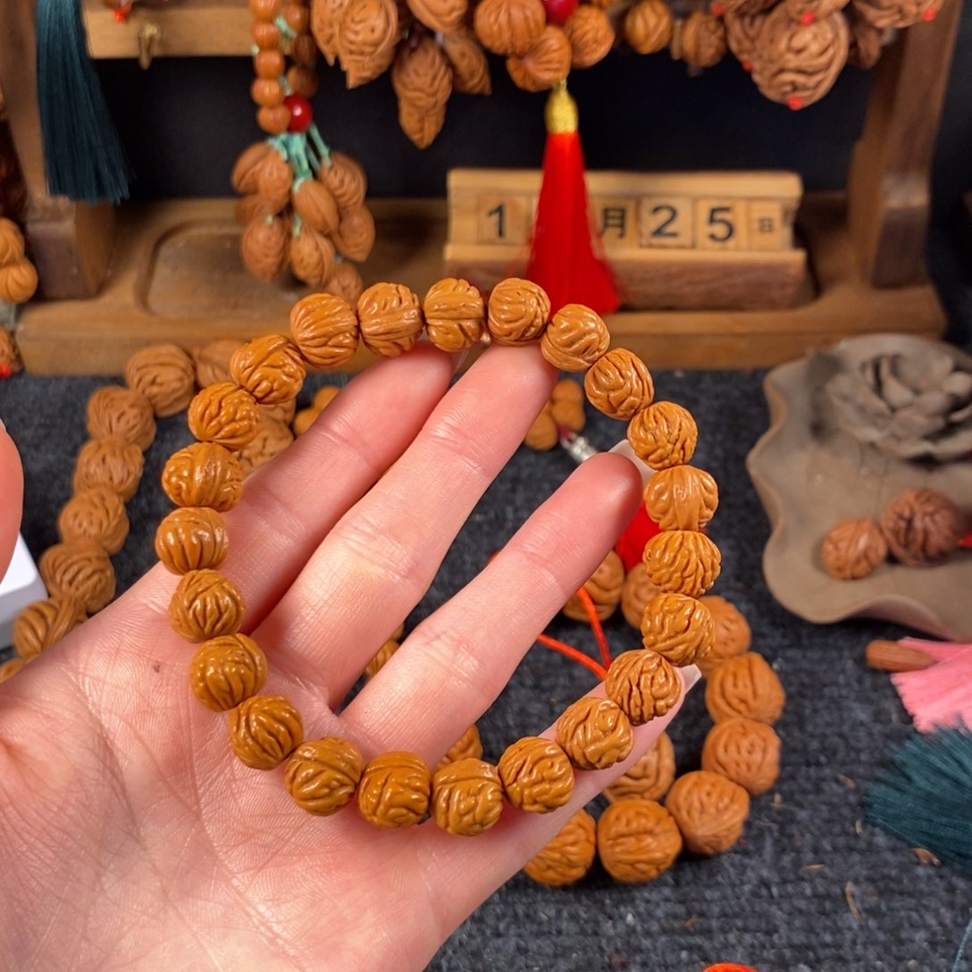 吊坠桃核R****o桃枭手串