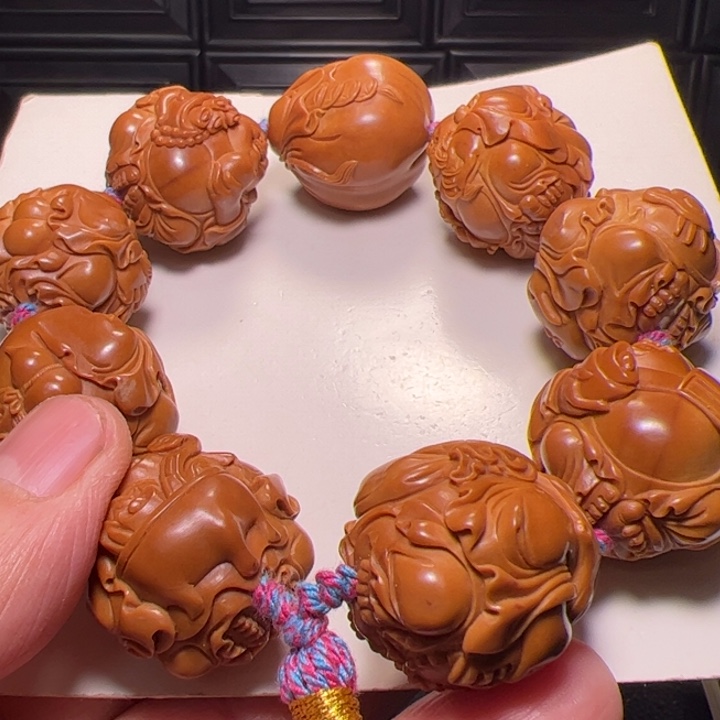 二***爷橄榄核手串八宝弥勒