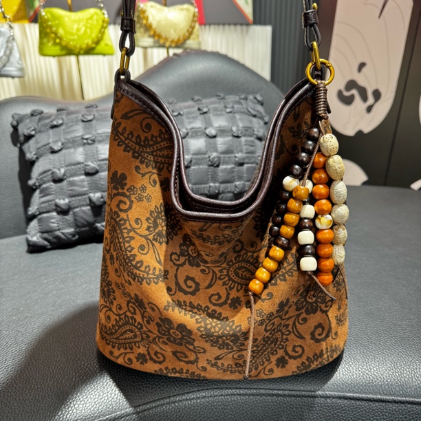 水桶包｜2025年秋冬琥珀流光风斜跨包复古棕色单肩包新中式牛皮包