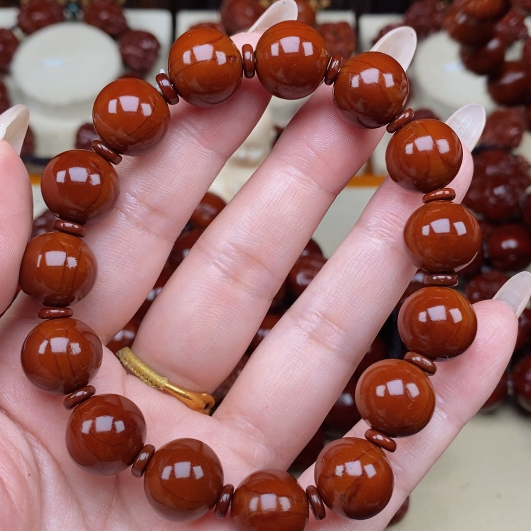 橄榄核吊坠哈****件正圆光珠