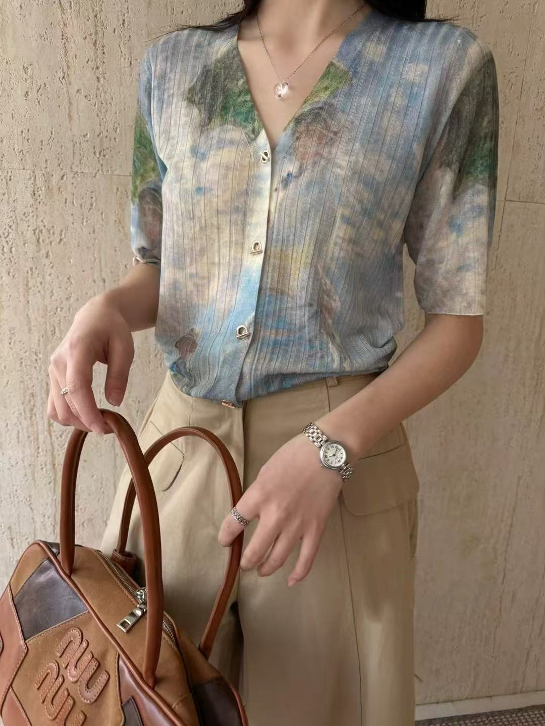 时尚休闲减龄宽松透气薄款印花高端圆领短袖针织衫2025夏开衫1380