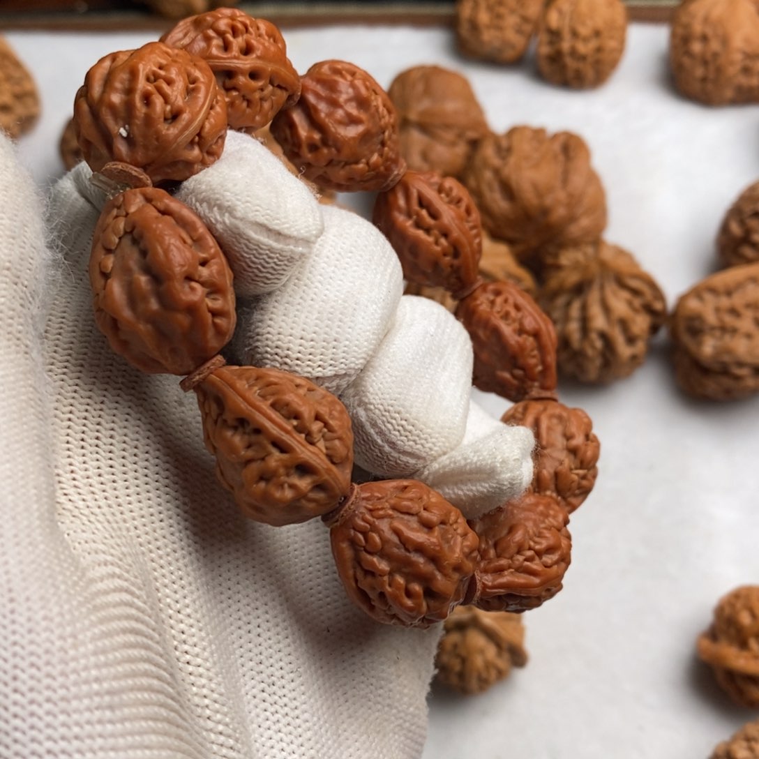 文玩核桃吊坠麒麟角