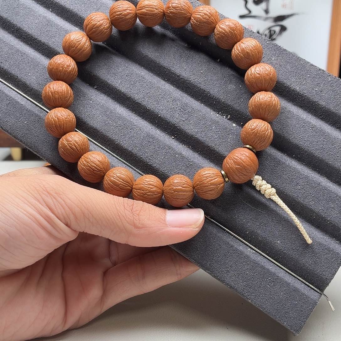 梁****猴头核桃吊坠14凤羽