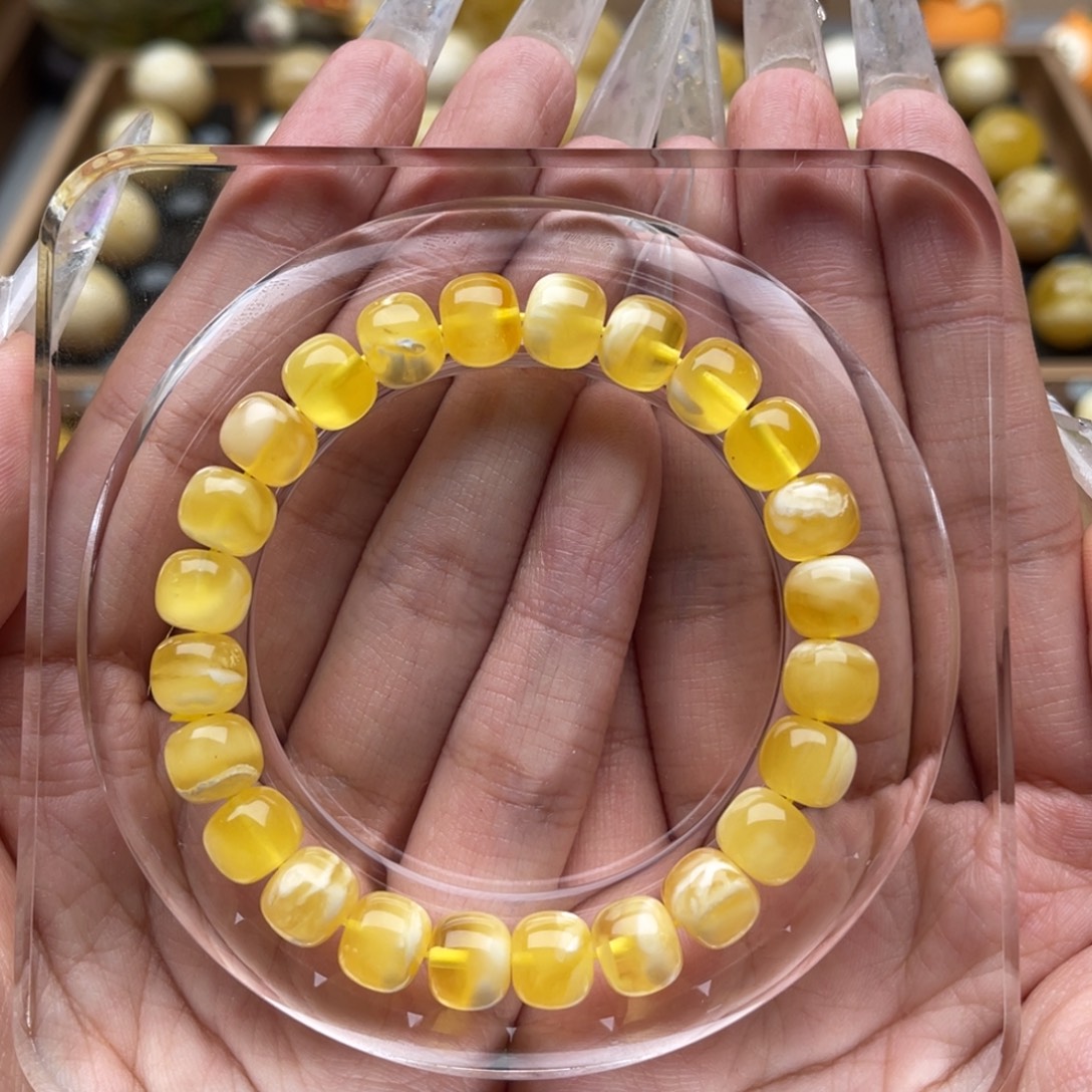 Y****琥珀未镶嵌裸石蜜蜡墩子手串微瑕静