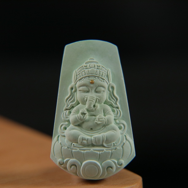 原矿绿松石菜籽黄镇财勇，尺寸18×29.5×8mm，重5.3g