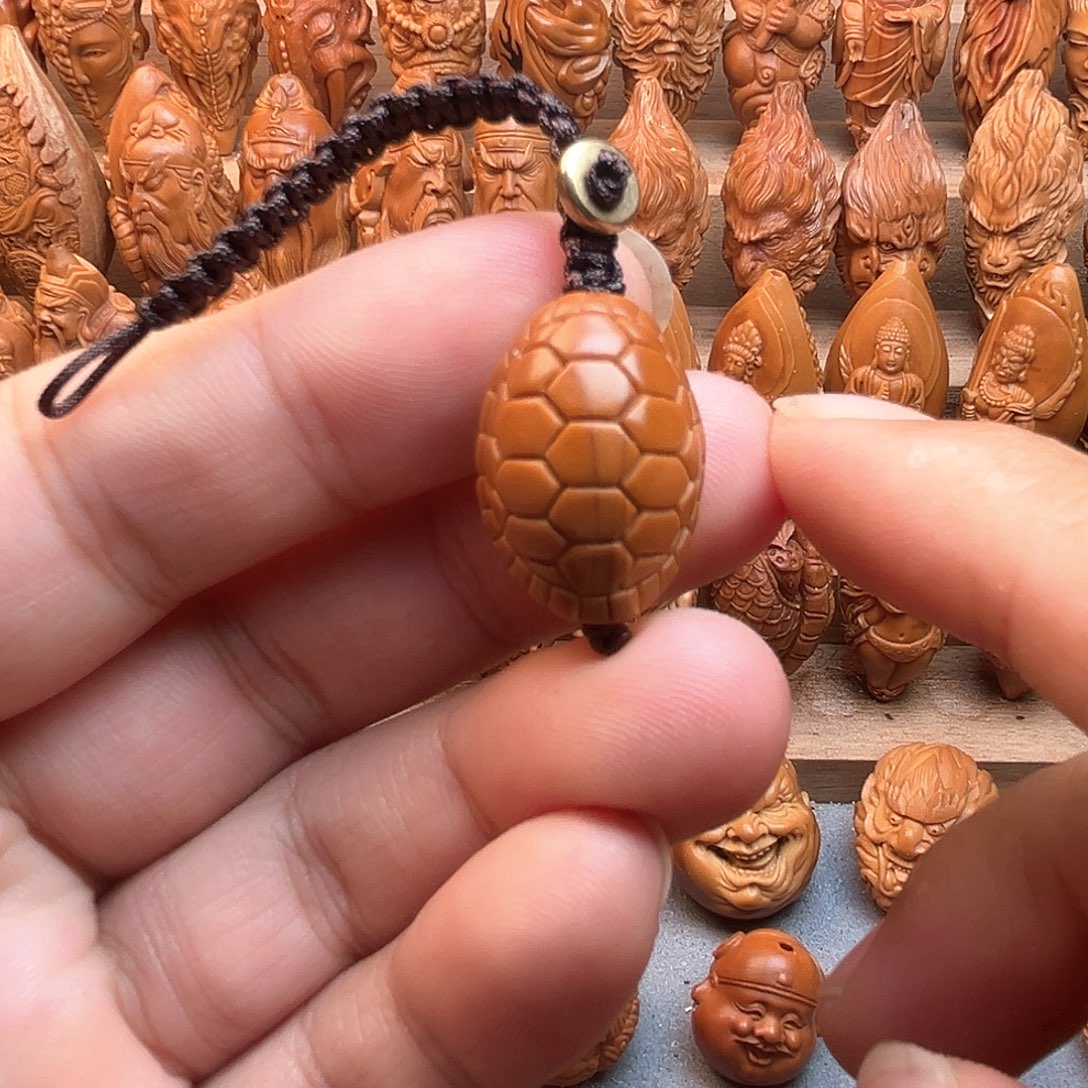 橄榄核吊坠17富甲天下