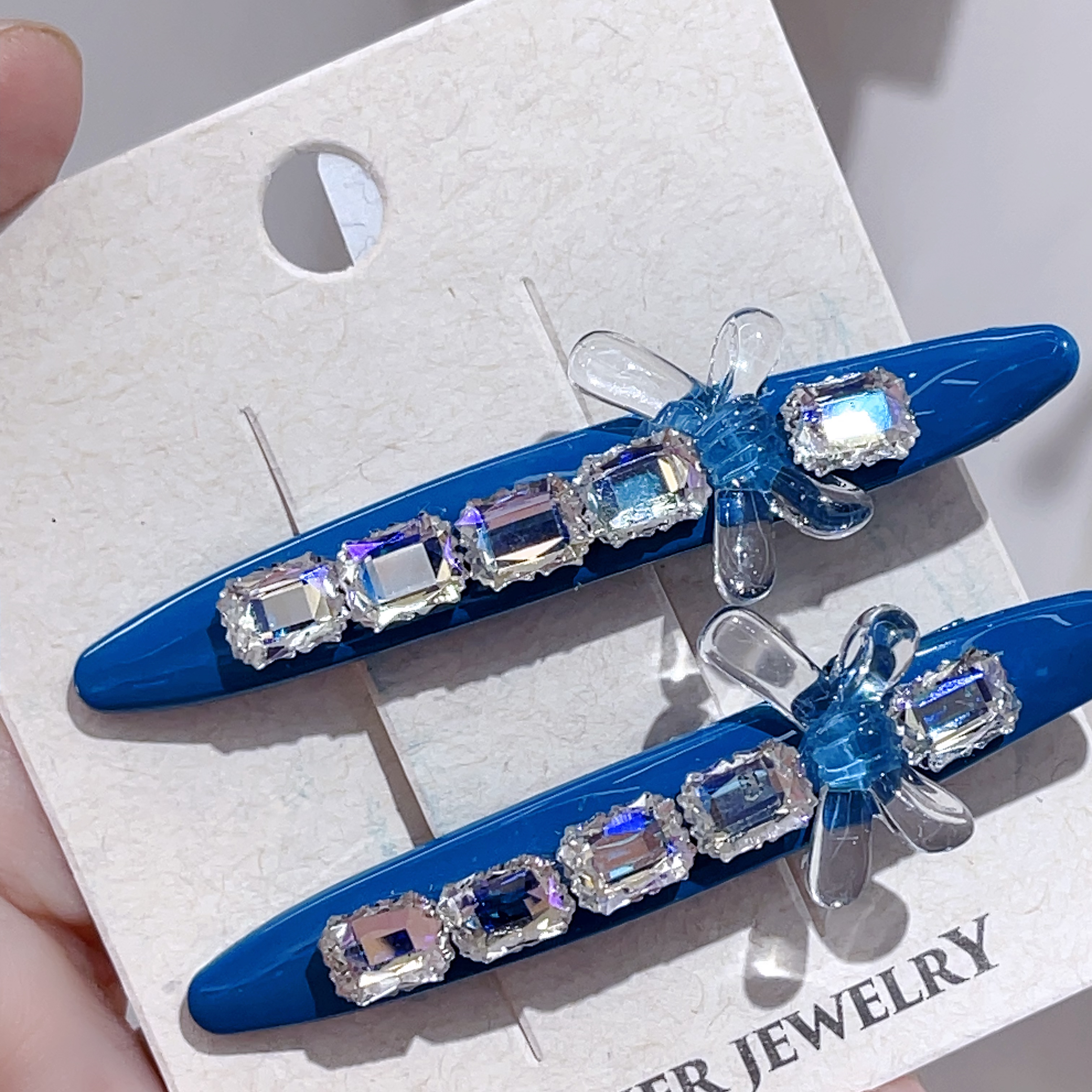 E759蓝色冰透蝴蝶满镶一对边夹