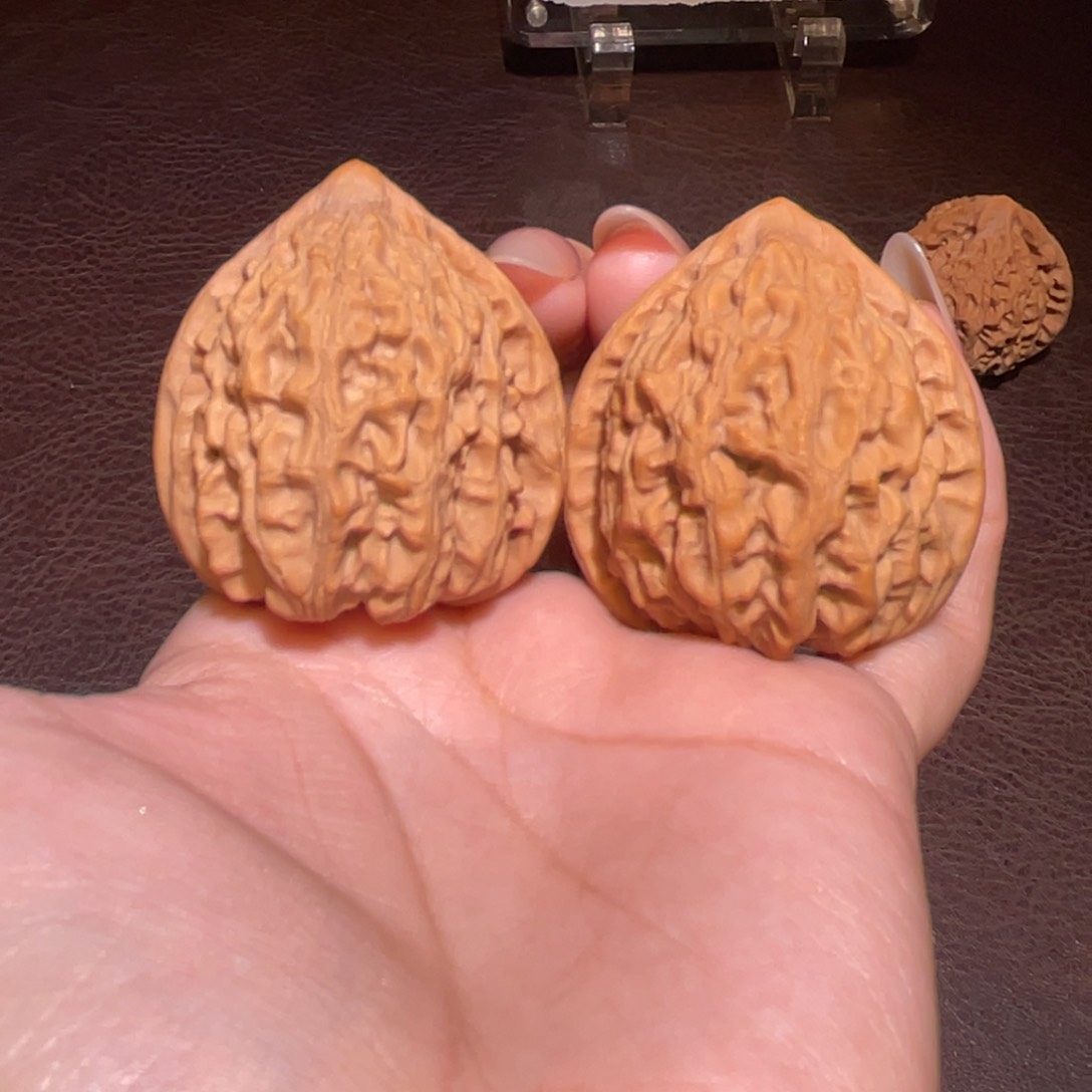 文玩核桃把件40金牛