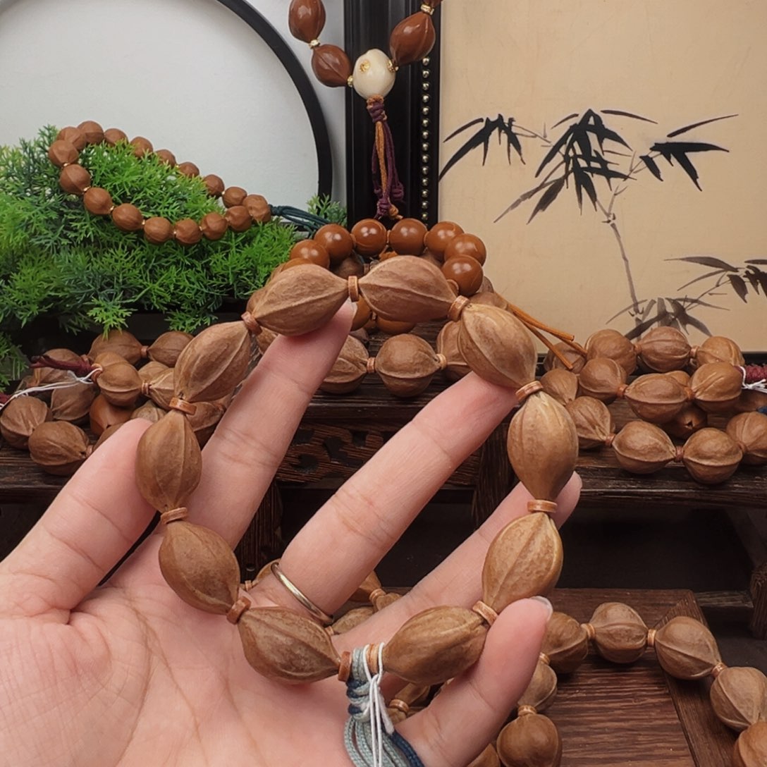 恰***o手串橄榄核16.24梅林铁核