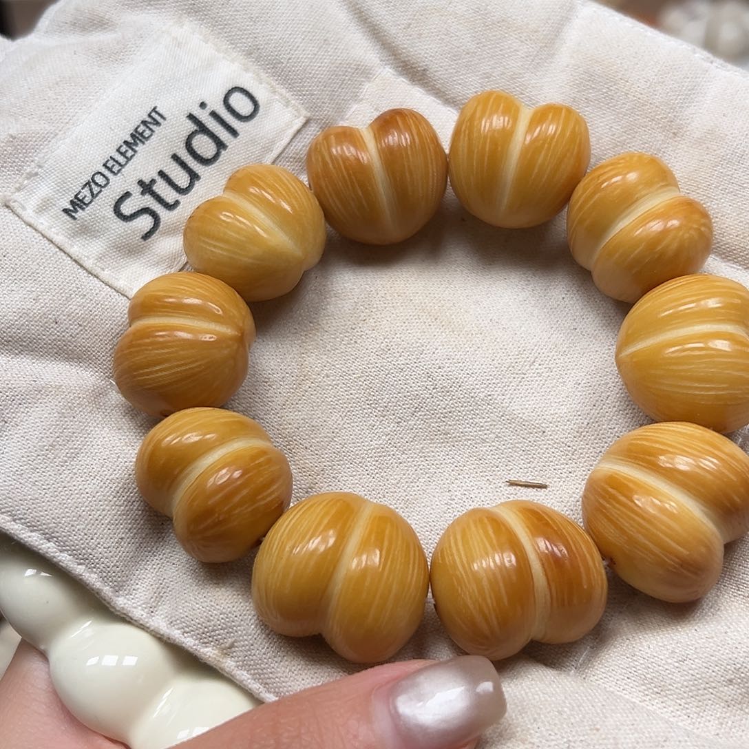 菩提根/象牙果手串瑕疵炭烤屁桃一串