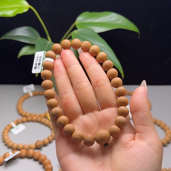 7***.吊坠猴头核桃凤羽