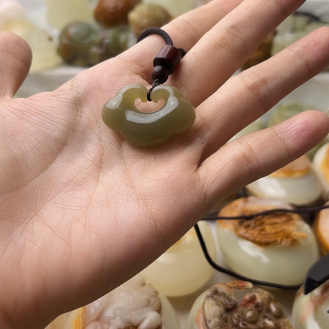 石材方解石手把摆件不退换祥云锁