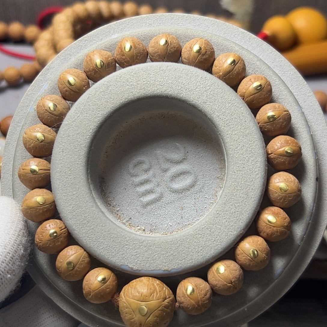 凤眼菩提手串贺****?11mm铜钉