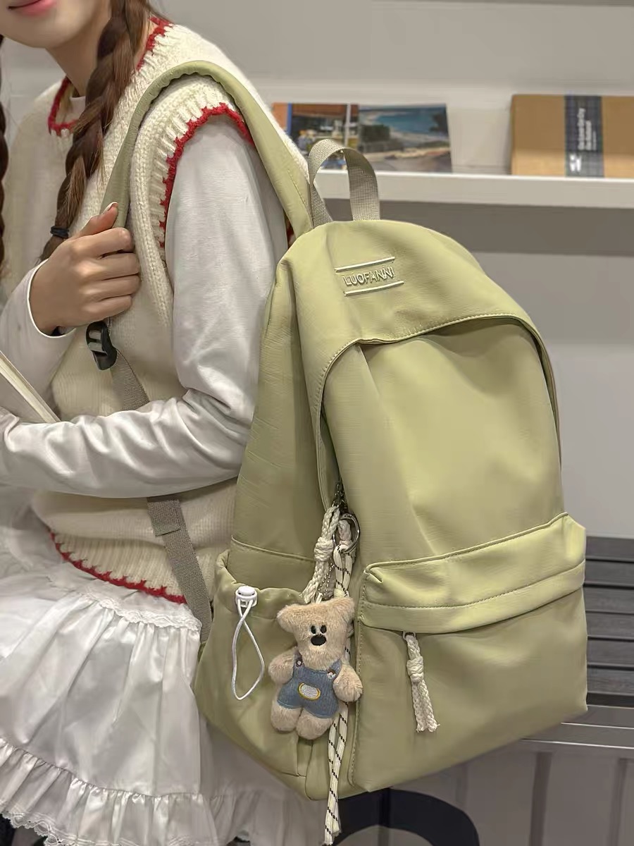 大小号书包初中女生小学生2025新款简约小背包高中生大学生双肩包