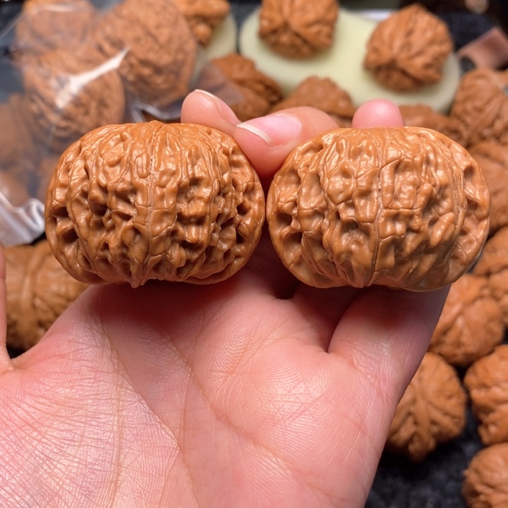 文玩核桃把件?****精野生红皮正磨42