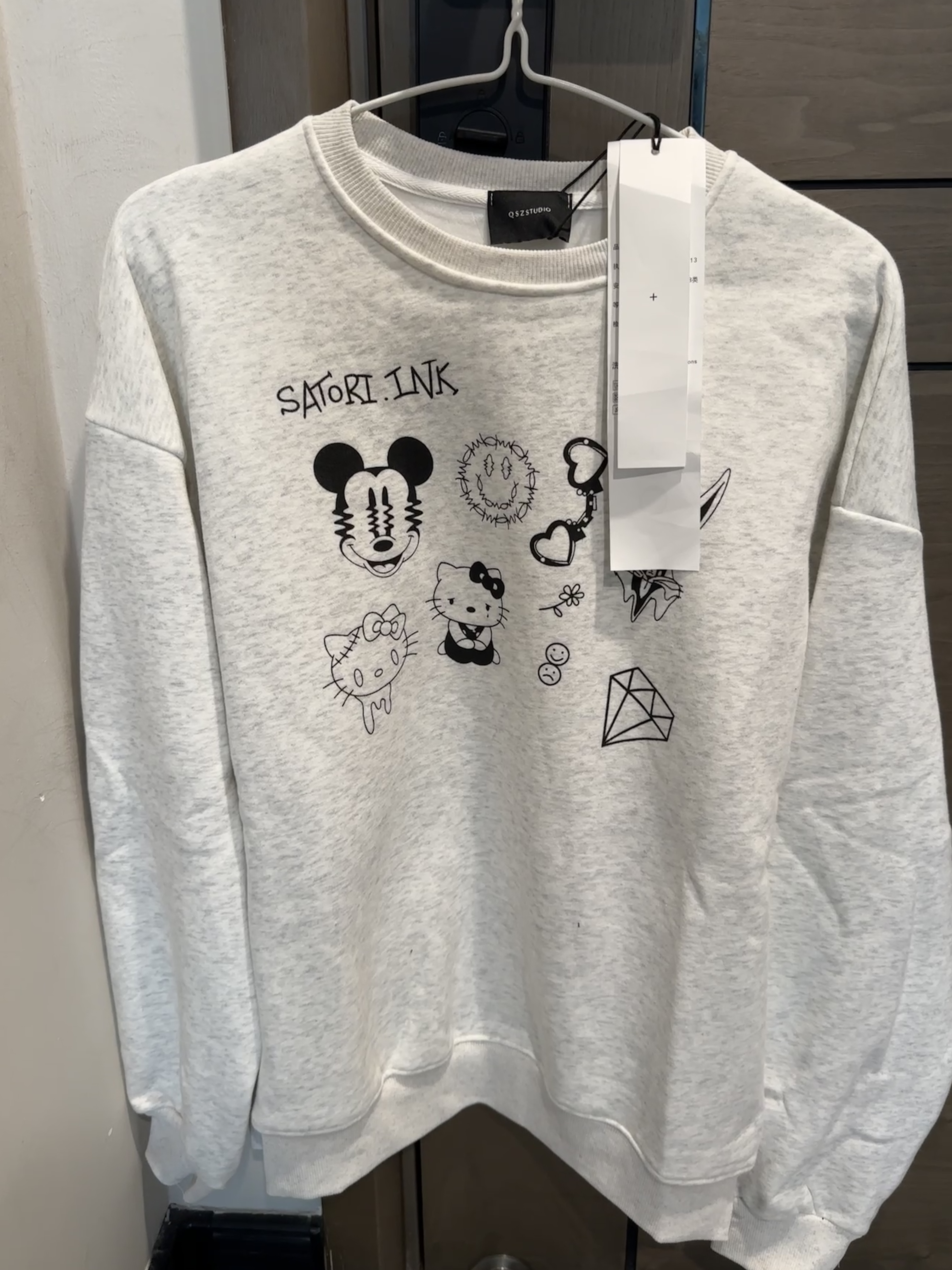 套头卫衣图案宽松