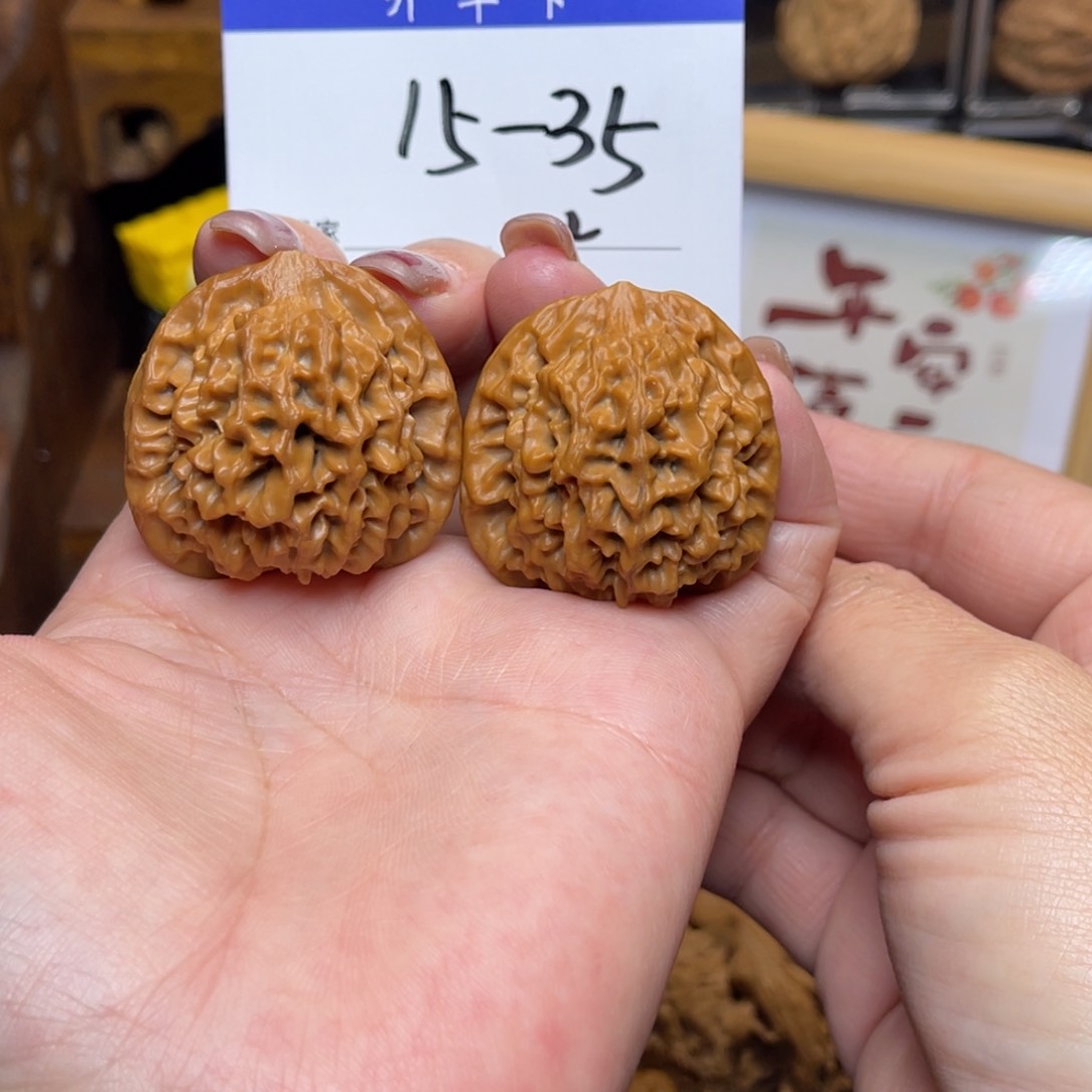 桃核把件管****.秦闷36李。