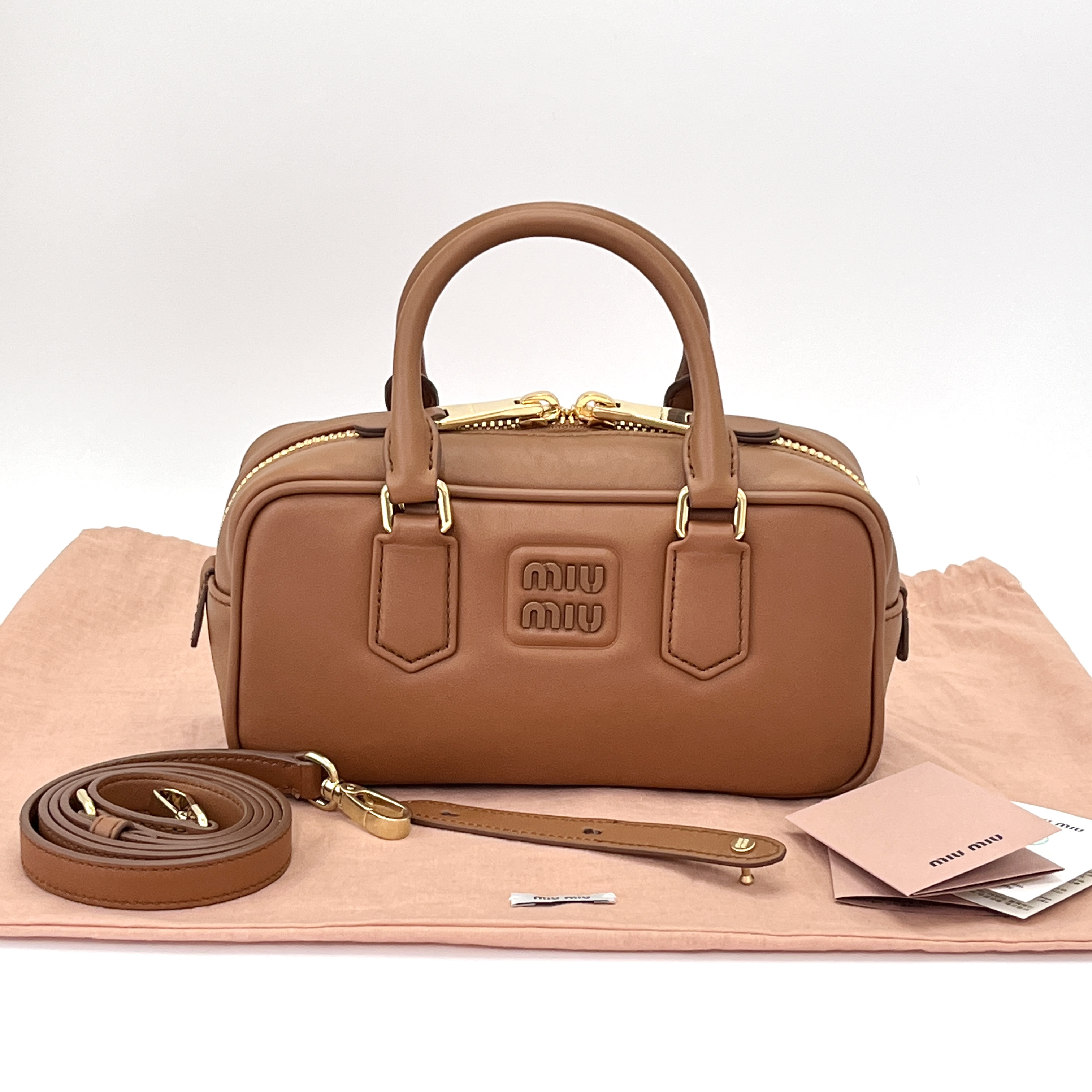 99新 MIU MIU/缪缪 Arcadie焦糖色金扣保龄球单肩斜挎包 56097