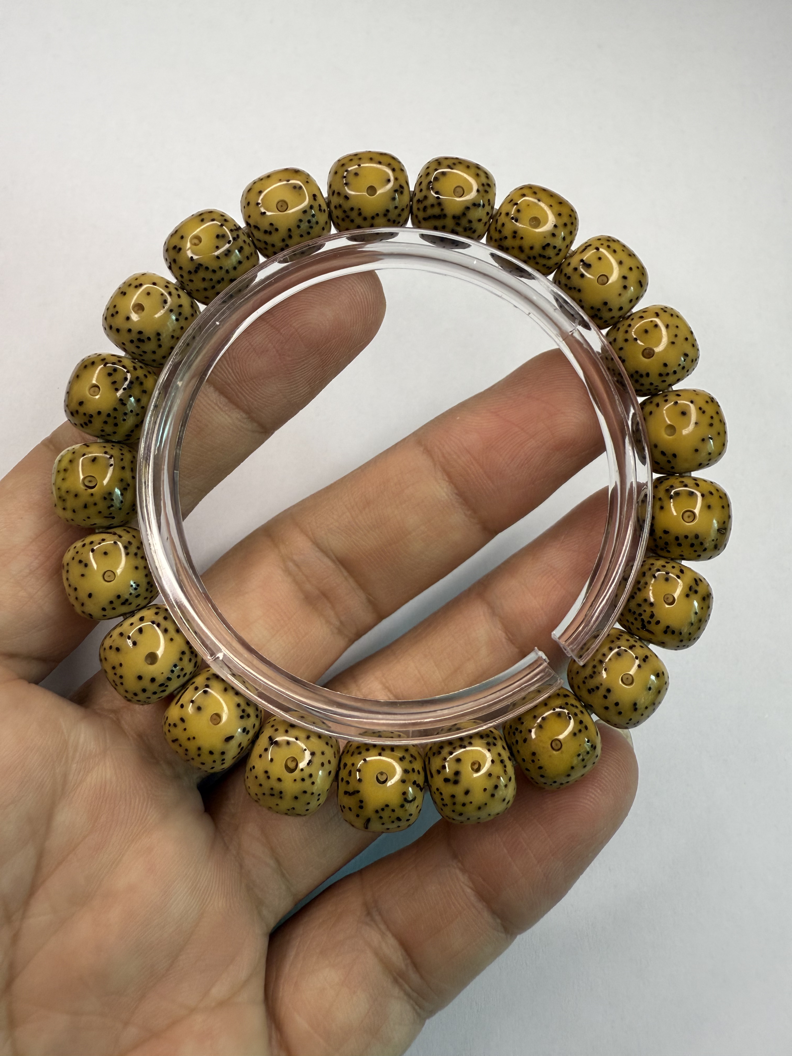 海南星月菩提石玉料打底鸡油黄月朗星稀侧留白小细星桶珠11*10