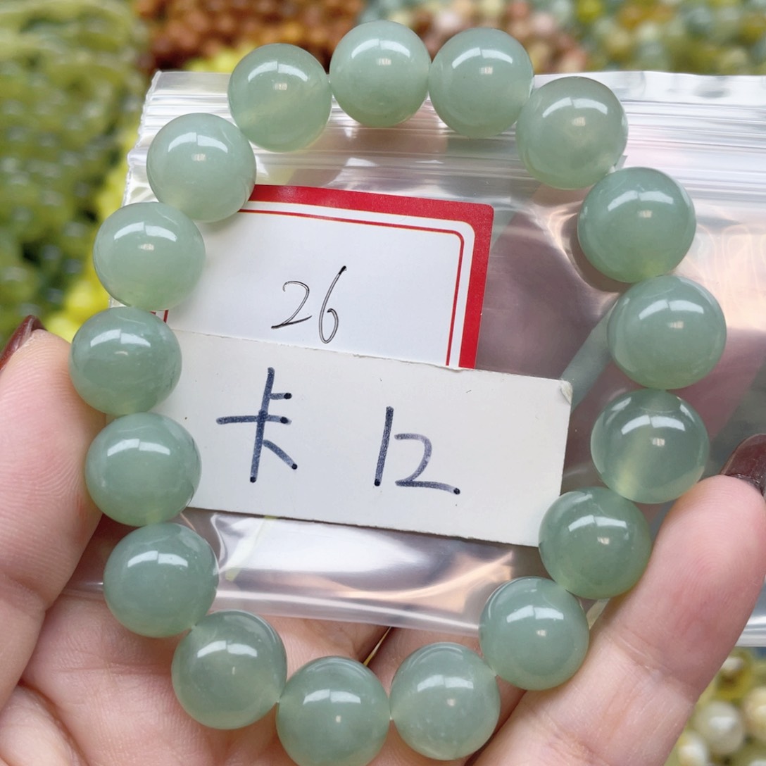 未镶嵌蛇纹石玉手串桃***困