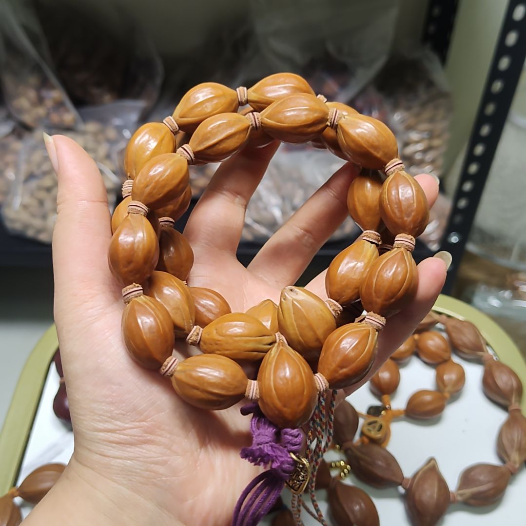 吊坠橄榄核小四花手串