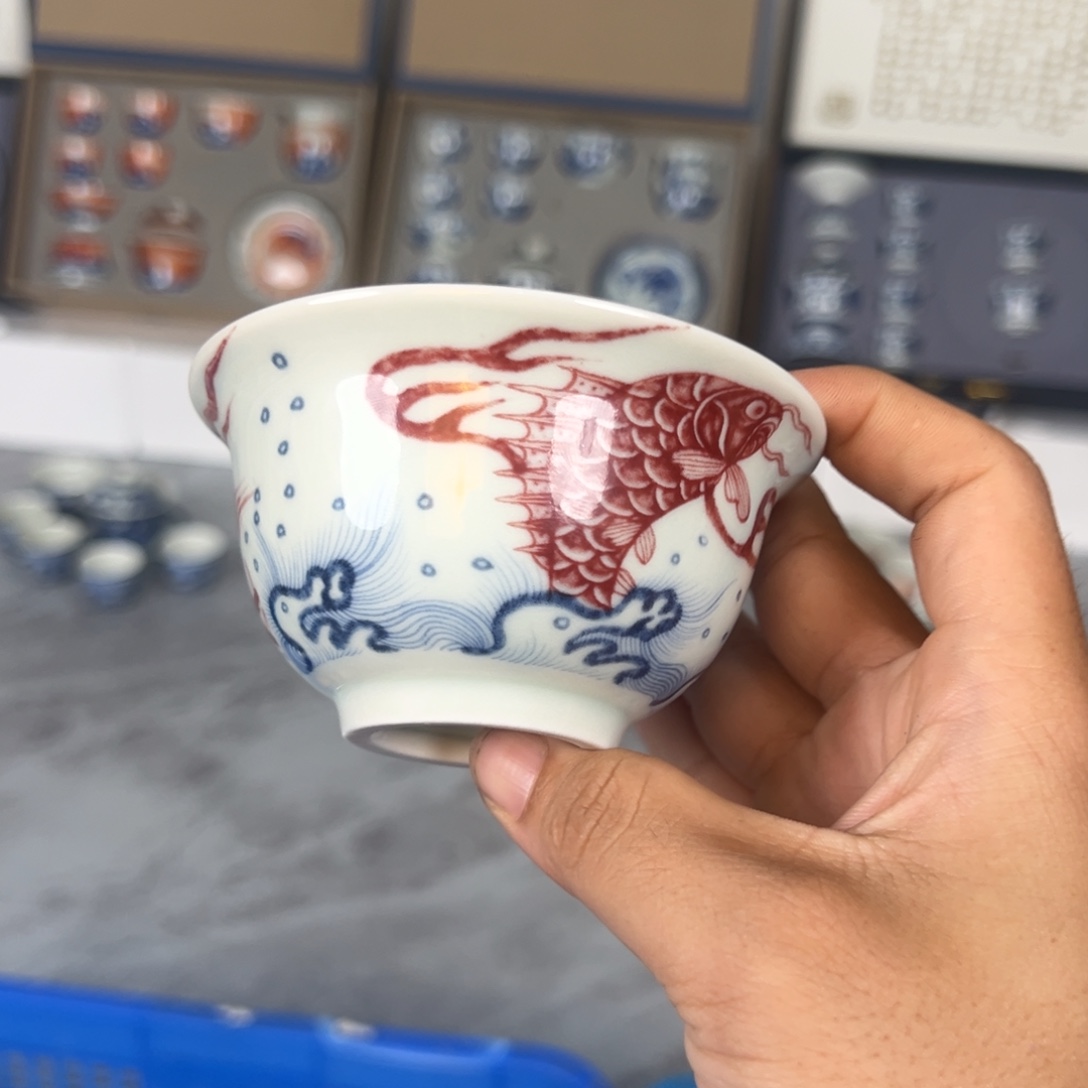 白青花釉里红鱼化龙压手杯