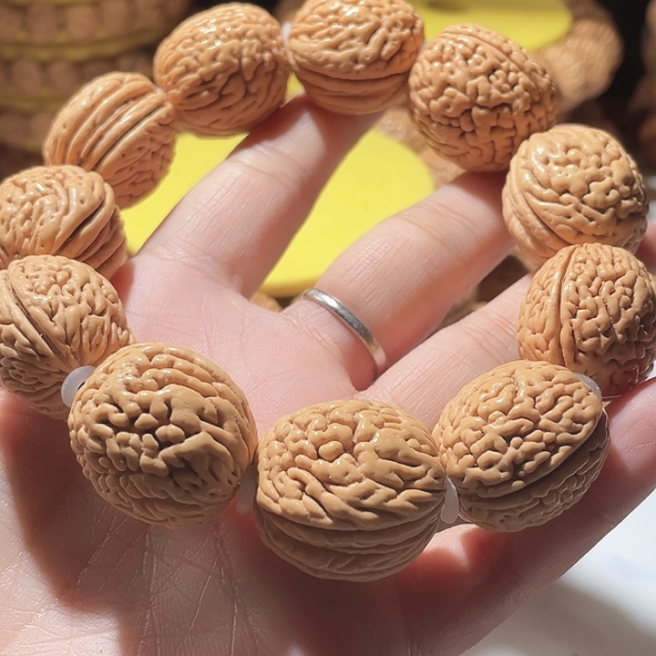 鲁***_桃核吊坠桃核手串钱袋子。2