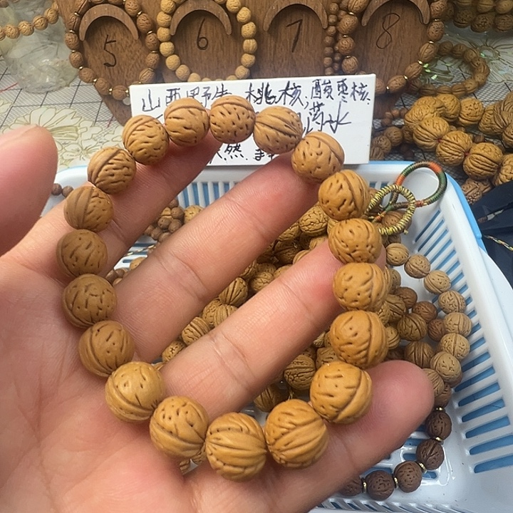 灵***风山西野生桃核手串