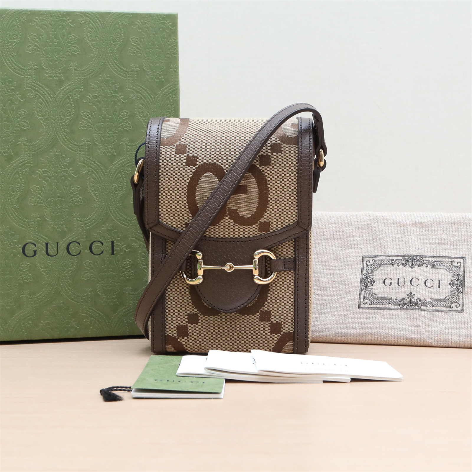 99新 GUCCI/古驰 马衔扣 三角插扣 手机包 乌木色 P244174212