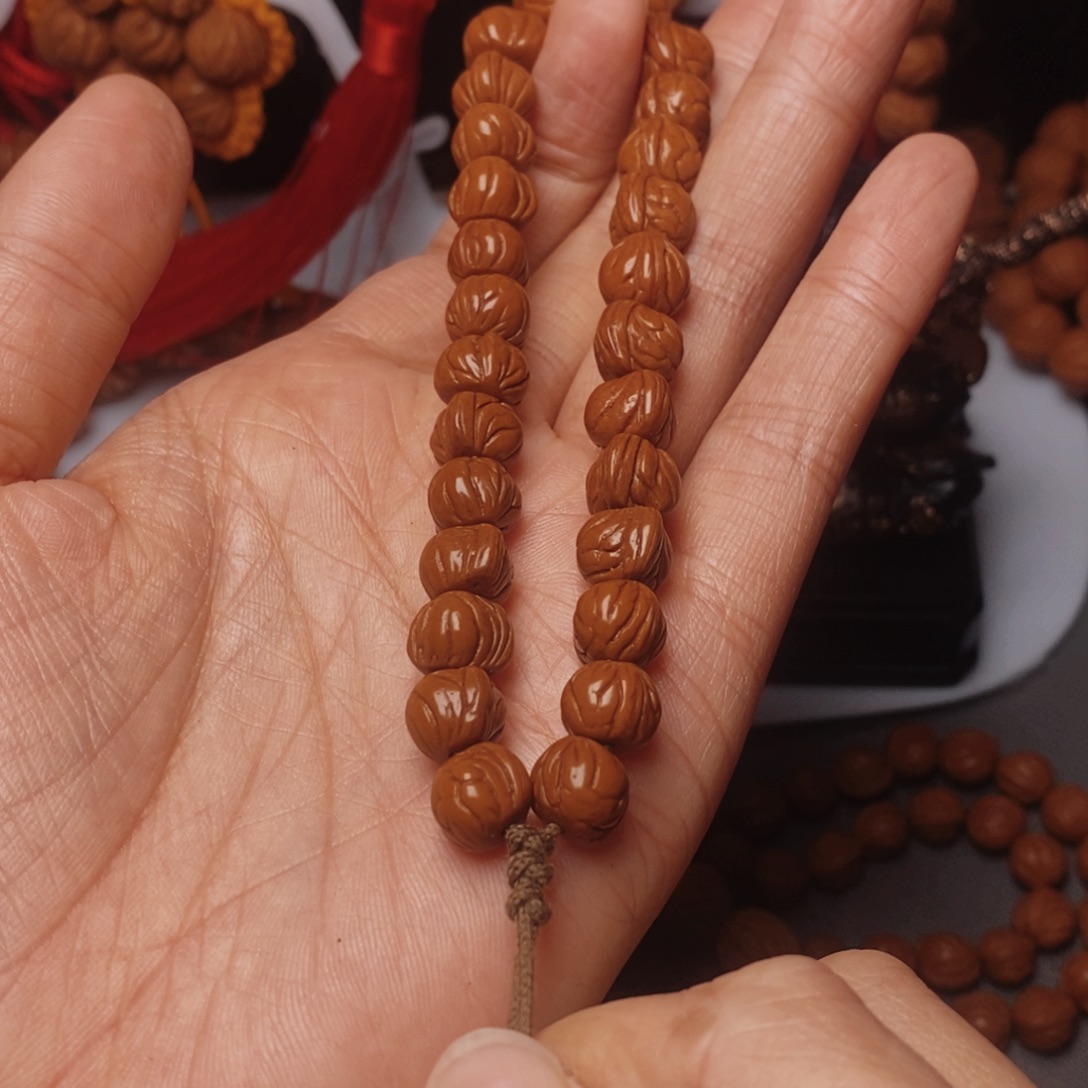 桃核吊坠桃枭手持1