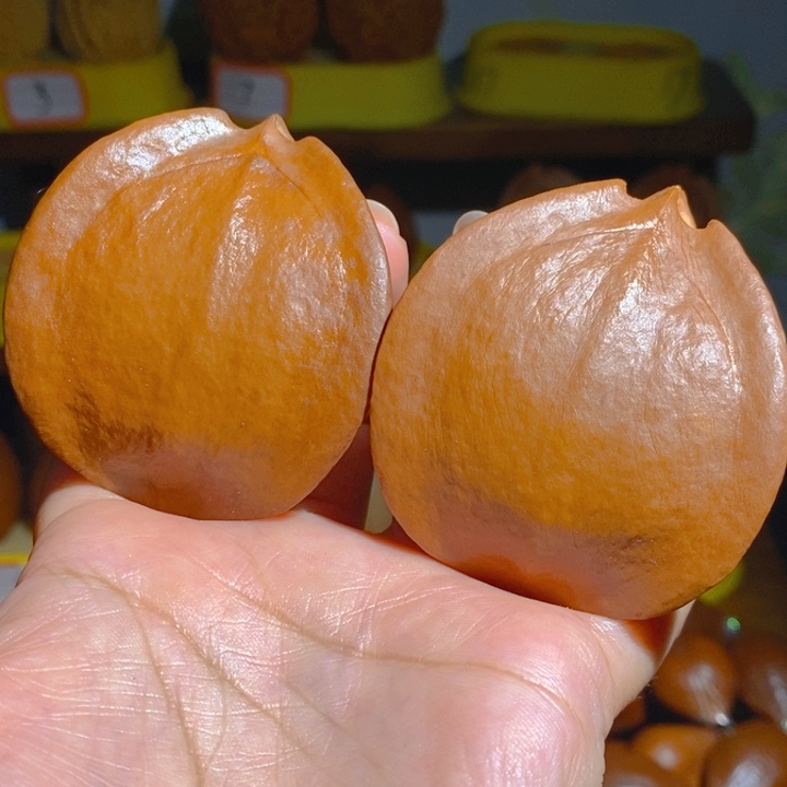 野生飞碟橄榄核手把件5263