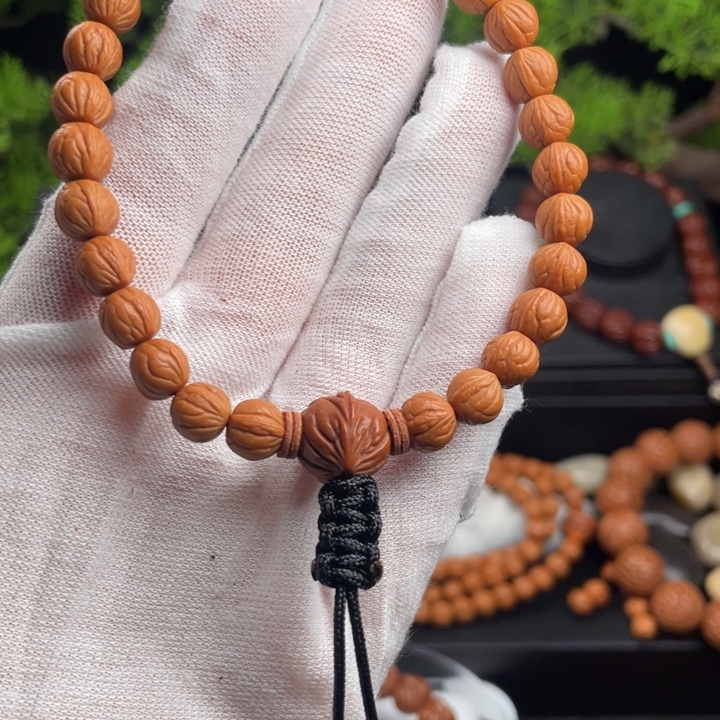 一***娴桃核吊坠精品手持