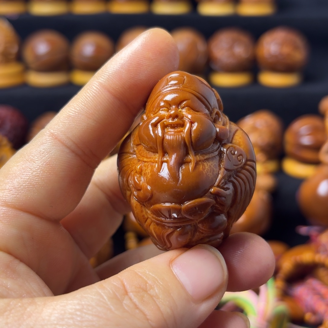 飘***去把件橄榄核财神一颗