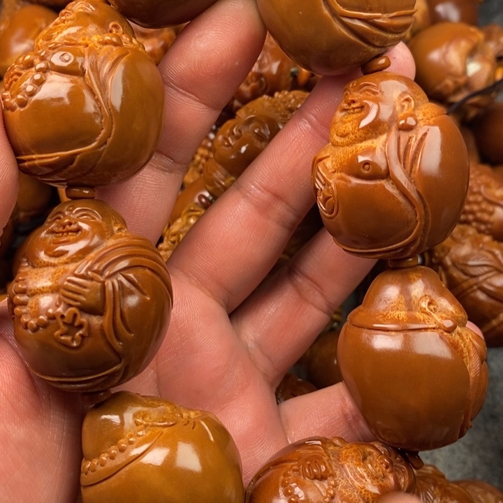 橄榄核吊坠?****橄榄核手持