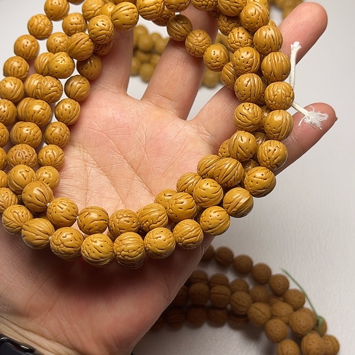 冷***锯桃核手串野生金豆博挂