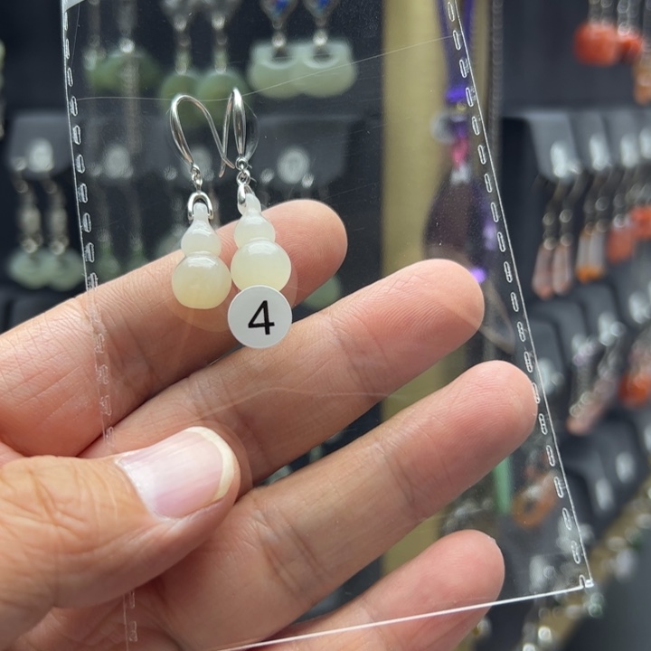 慕***锶和田玉银S925镶嵌耳饰