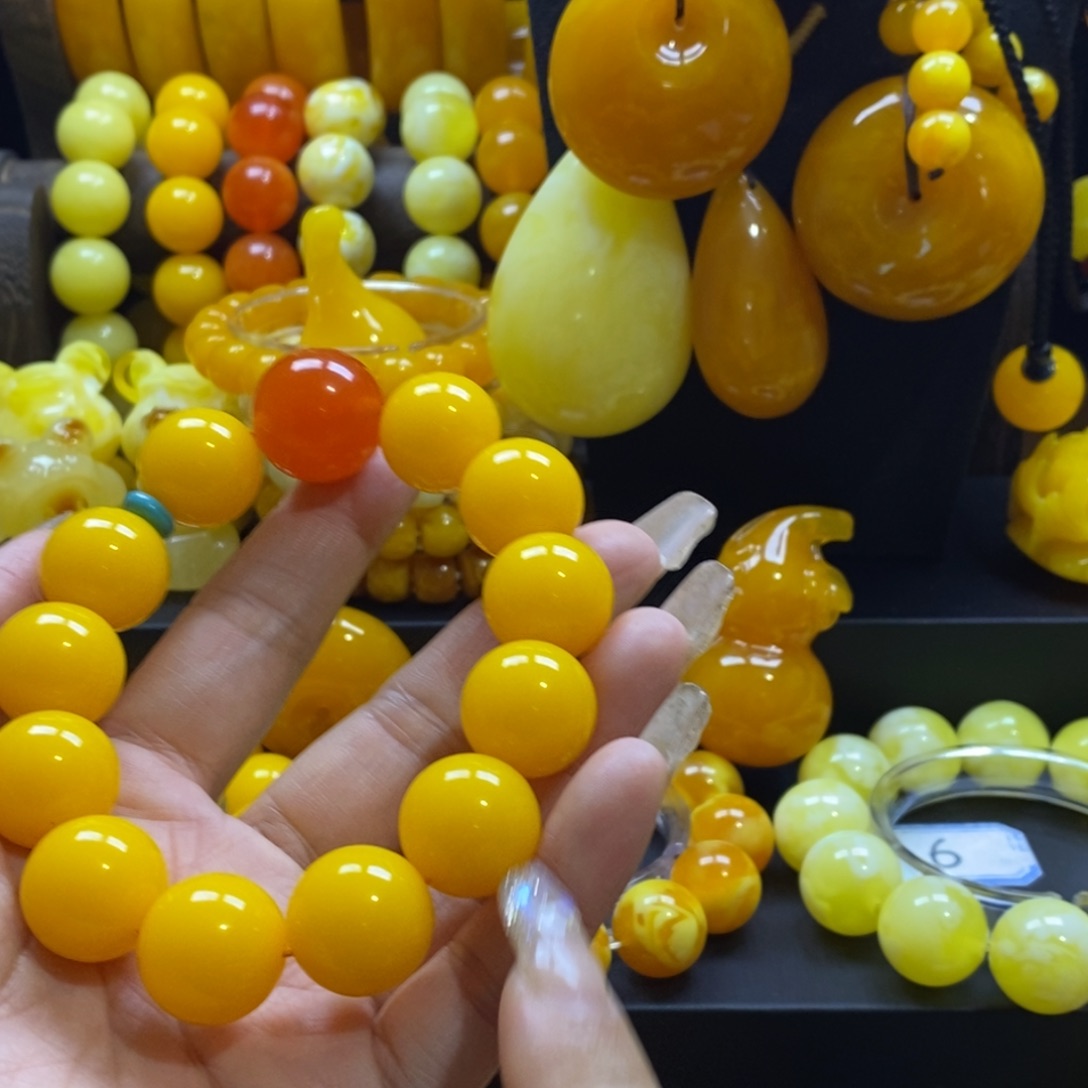 H***鹏非金属鸡油花蜜18手串全品