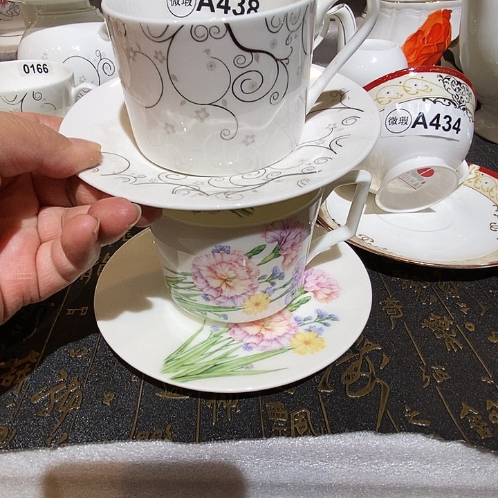 用***5骨质瓷库存产品杯碟各一