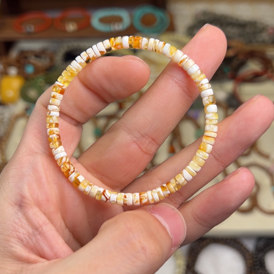 琥珀未镶嵌手串金瓷白妖花药片手串