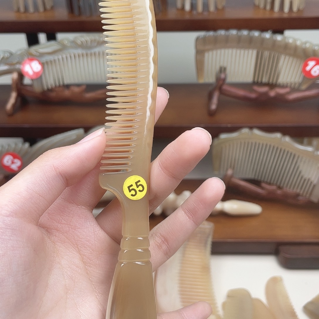 纯手工制作的牛角梳55y*g