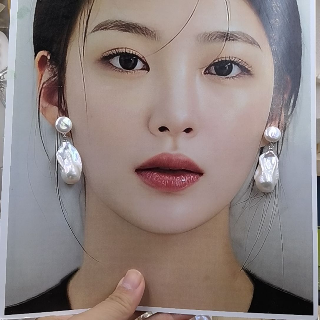 骑***王银S925镶嵌淡水珍珠耳饰