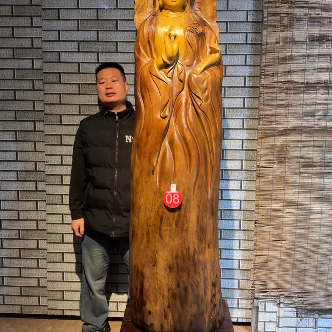 香樟木因****变香樟木材质南海观音232 52 49 