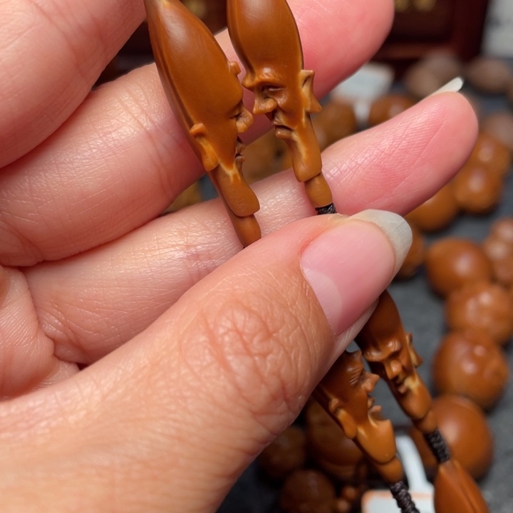 橄榄核吊坠小****?橄榄核